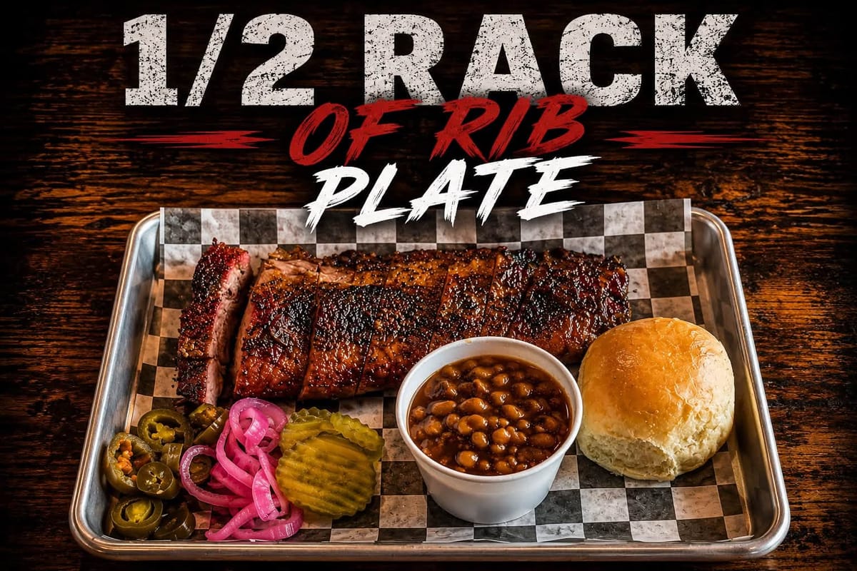 Half rack of ribs plate with baked beans, pickles and a roll